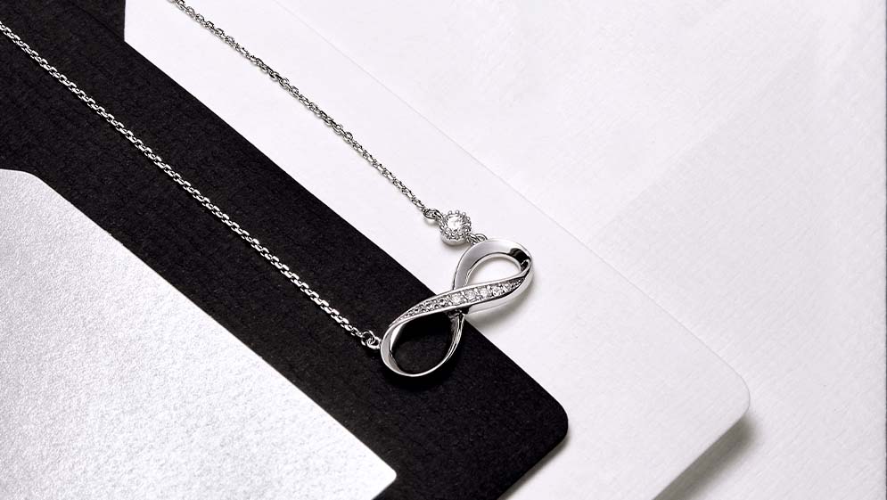 Meaning of infinity in jewelry. History and meaning